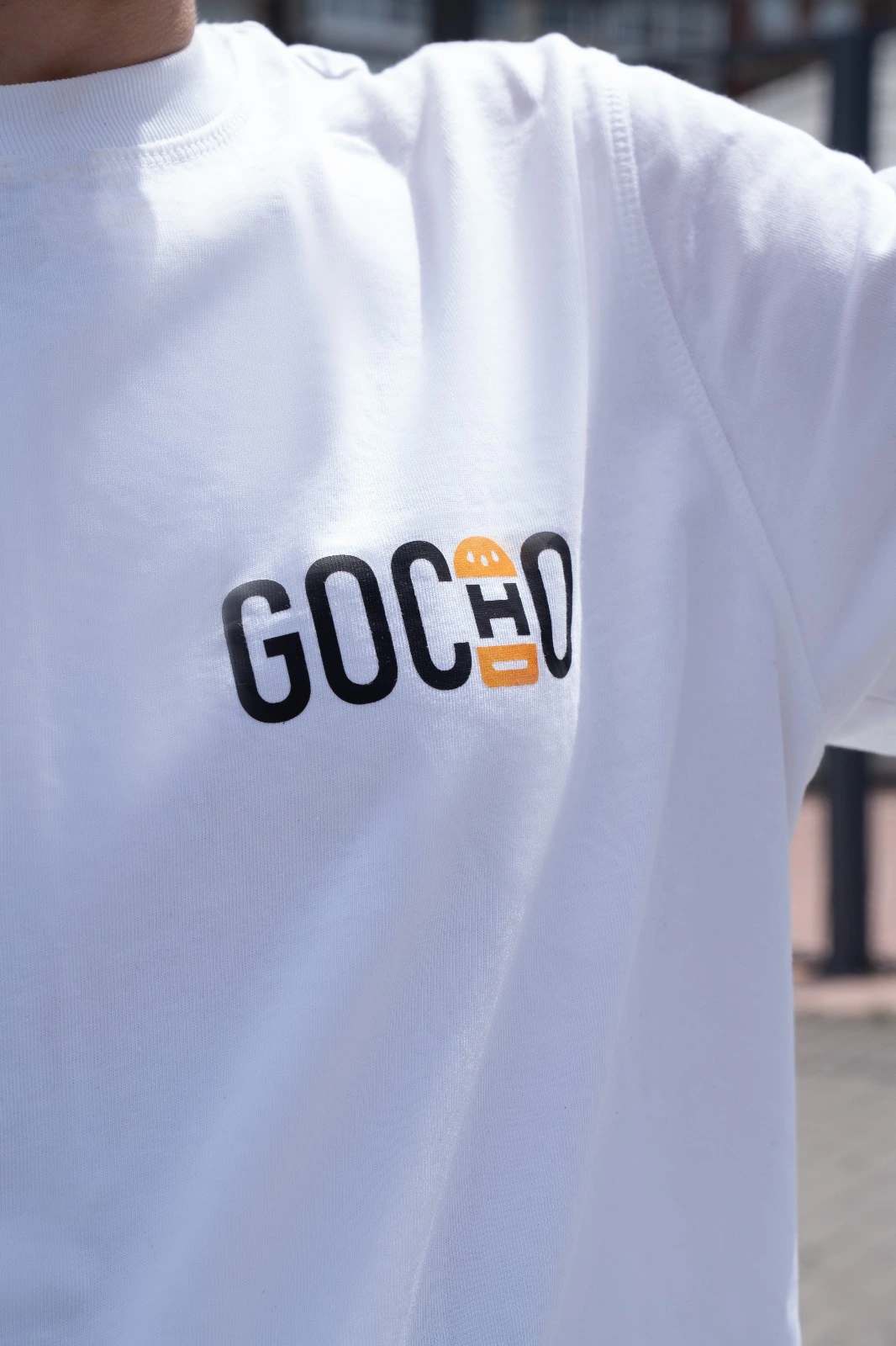 Logo de Gocho hamburguesas sobre una camiseta